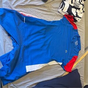 Lacoste Blue Shirt with Red and White Accents